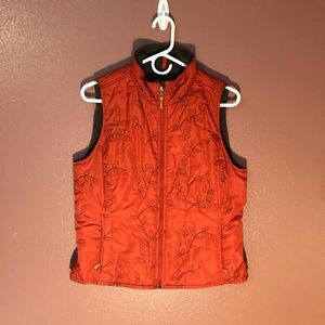 Eddie Bauer orange vest sz M. This is more of a rust color orange. I need neon